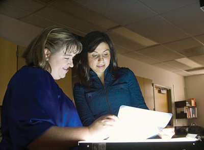 Women looking at medical records